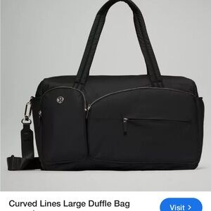 Lululemon Athletica Black Travel Bag with Curved Silhouette Excellent condition